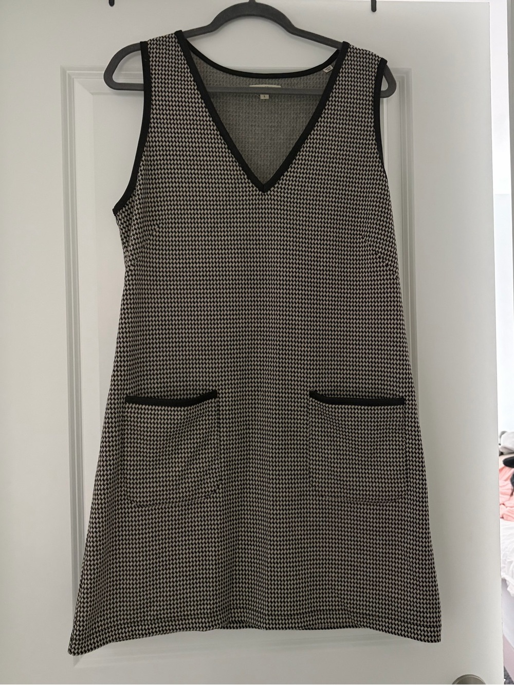 Black and cream checked jumper with pockets